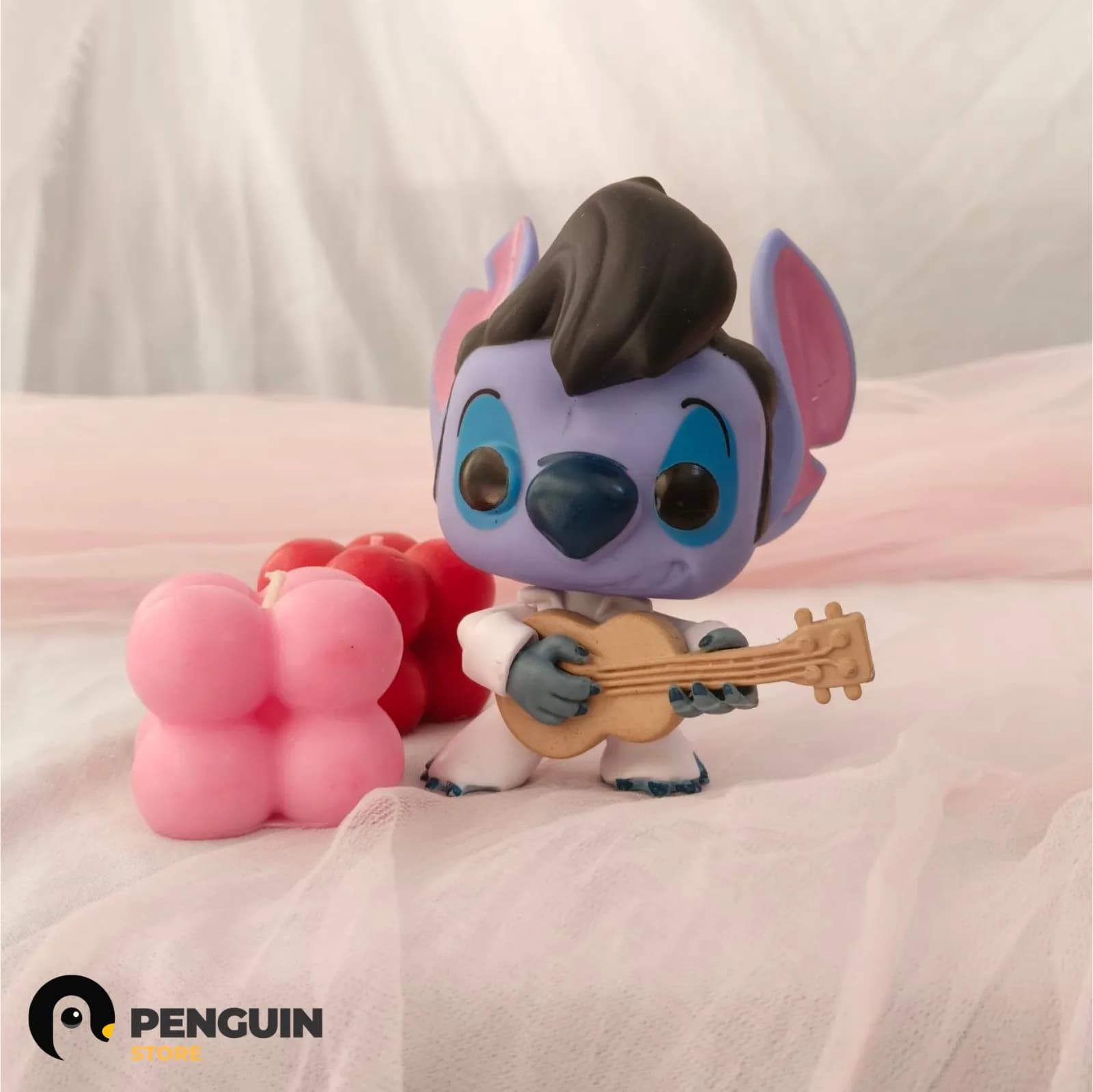 فيجر "ستيتش" (Stitch) بستايل إلفيس بريسلي - تحفة ديكور "Funko Style" لعشاق الموسيقى والـ Setup الراقي من Penguin Store 🎸🕺✨